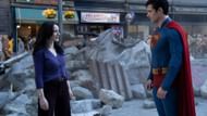 Lois Lane meets Superman on a ruined city street after a major battle. (Image via DC)